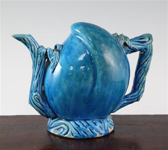 A Chinese turquoise glazed peach shaped cadogan type wine pot, 19th century, height 17.5cm